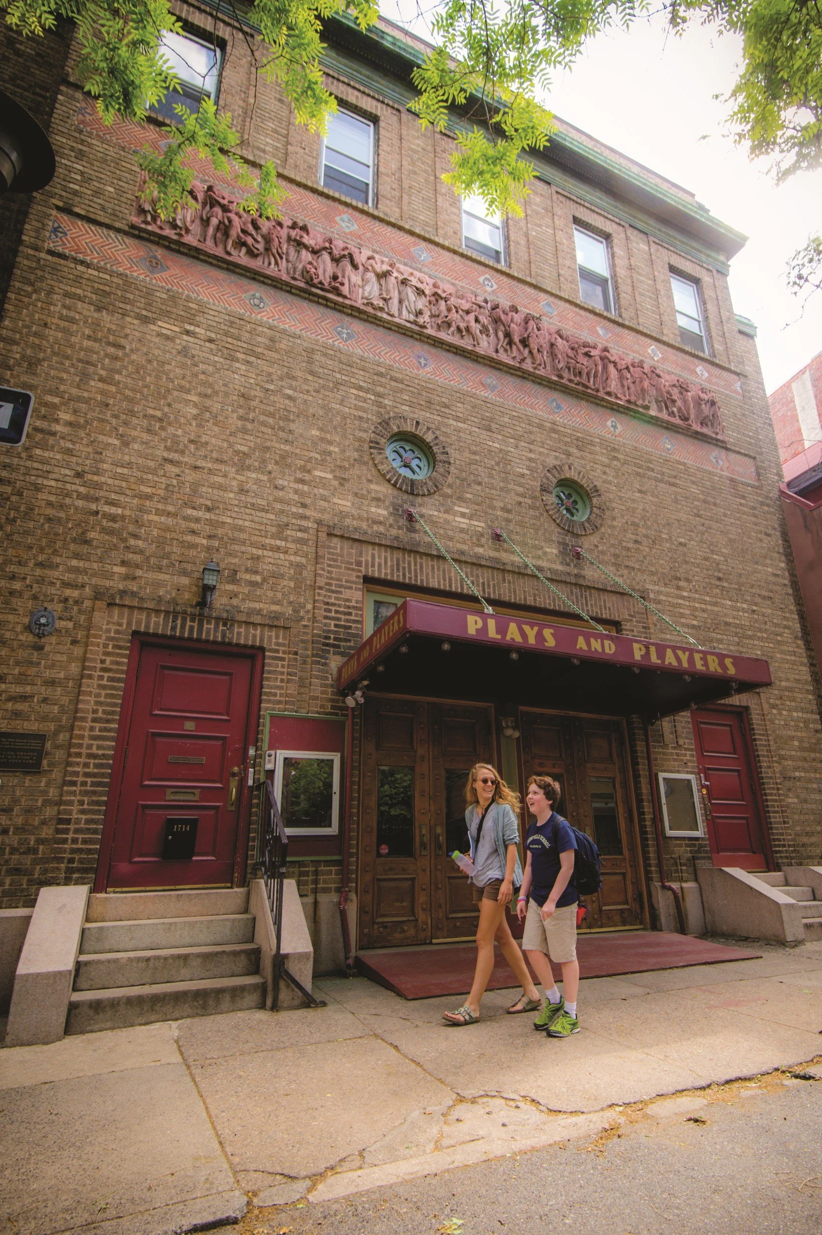 The Plays and Players facade and red marquee on Delancey Place